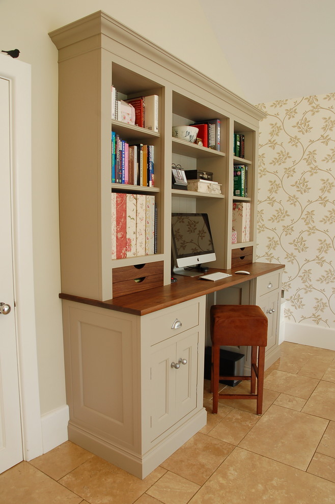 Inspiration for a mid-sized built-in desk study room remodel in Wiltshire with multicolored walls