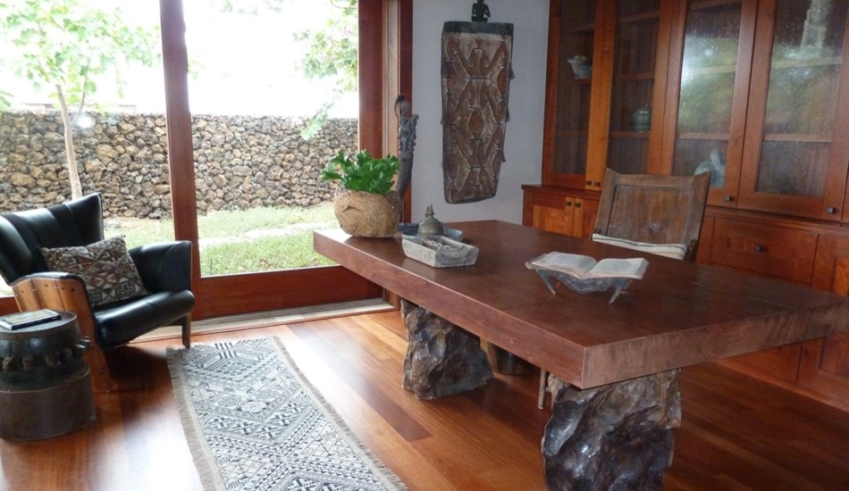 Photo of a medium sized rustic study in Hawaii with white walls, medium hardwood flooring, no fireplace and a freestanding desk.