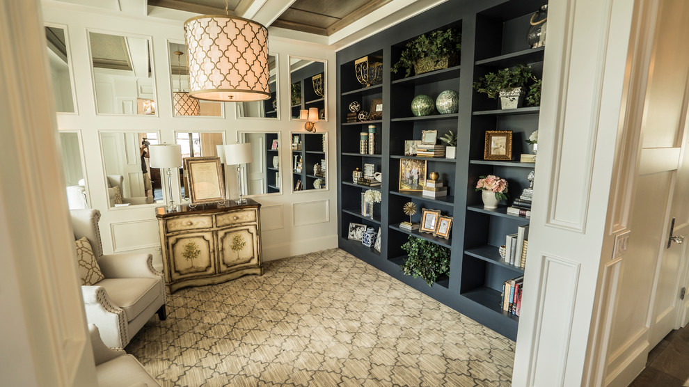 Home office library - mid-sized coastal carpeted home office library idea in Salt Lake City with beige walls