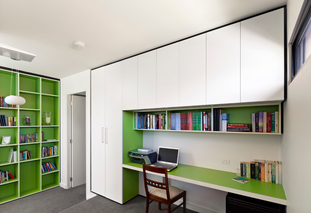 Small trendy built-in desk carpeted and gray floor study room photo in Melbourne with white walls