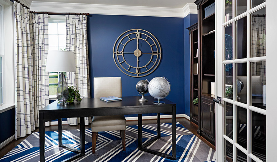 Photo of a contemporary home office in Denver with blue walls.