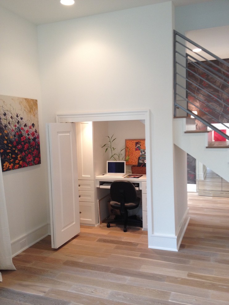 Home office - contemporary beige floor home office idea in Austin with white walls