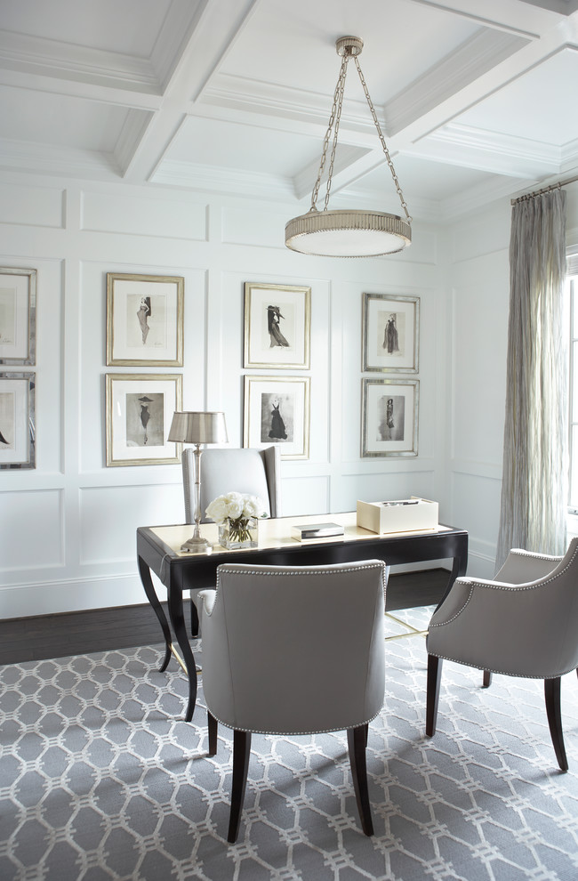 Study room - large traditional freestanding desk dark wood floor study room idea in Other with white walls