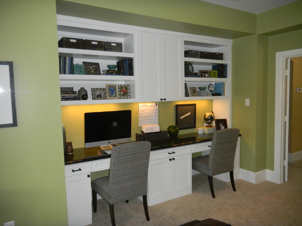 Example of a transitional home office design in Houston