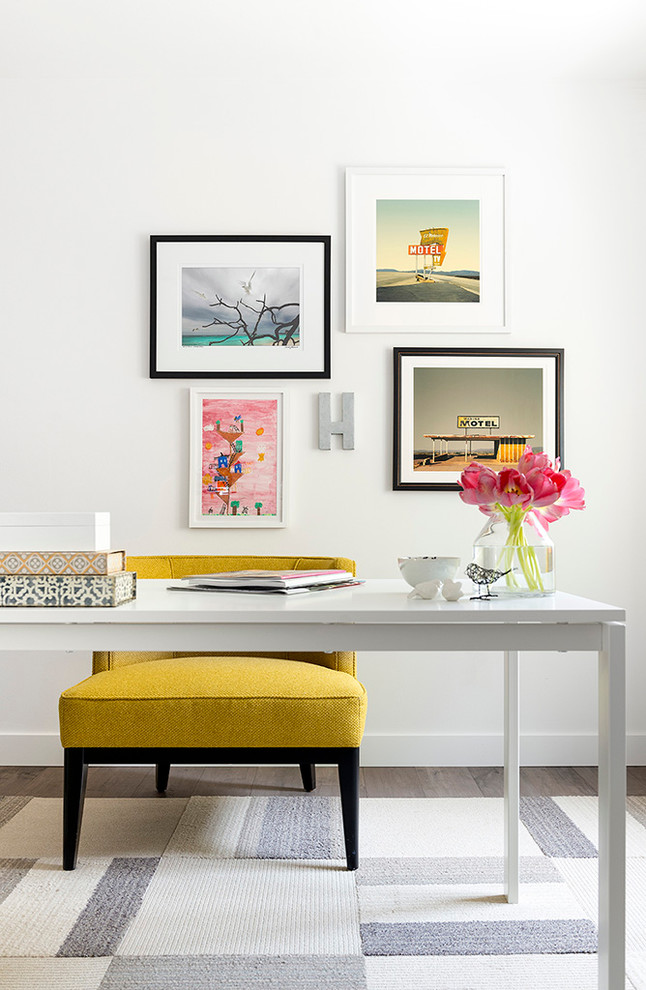 Study room - mid-sized transitional freestanding desk dark wood floor study room idea in Los Angeles with white walls