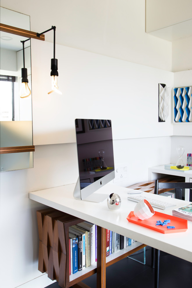 Example of a trendy home office design in Mumbai