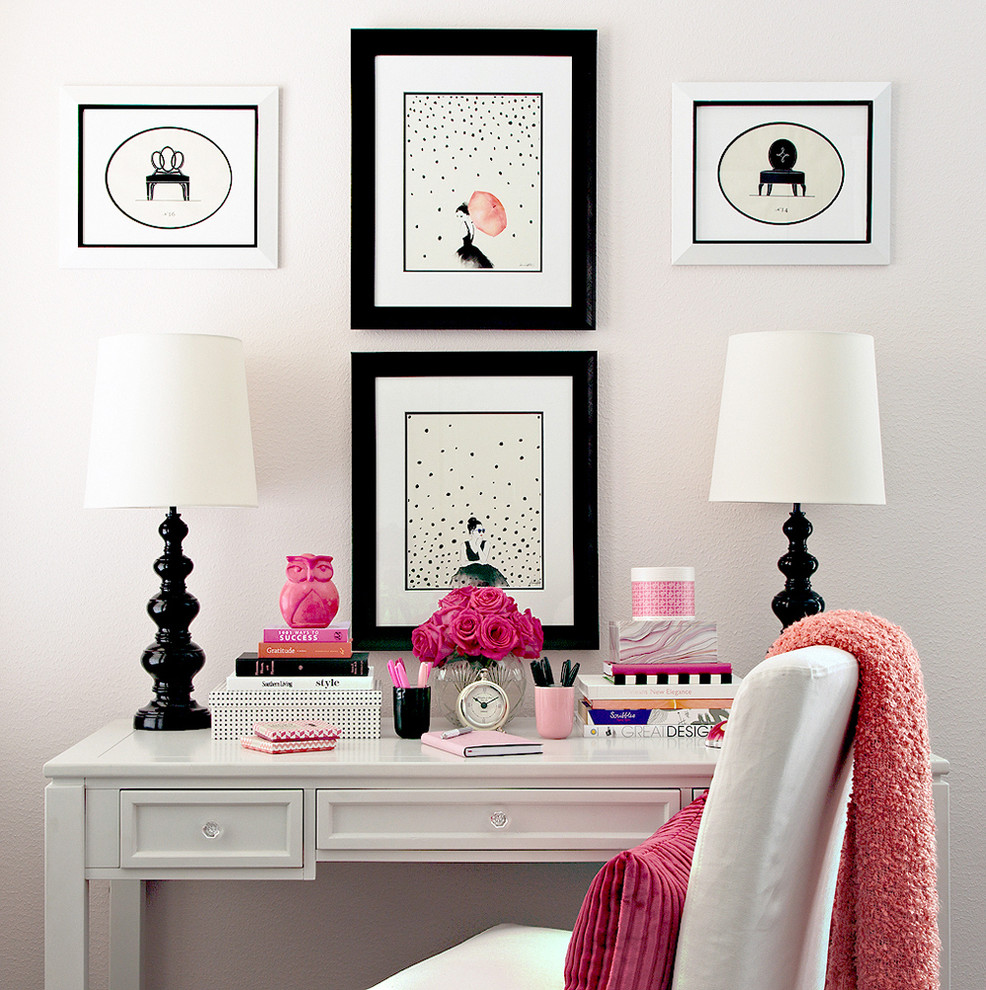 Inspiration for a small modern freestanding desk home office remodel in Houston with white walls