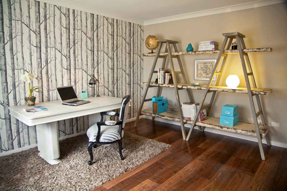 Inspiration for an eclectic freestanding desk dark wood floor home office remodel in Sydney with beige walls