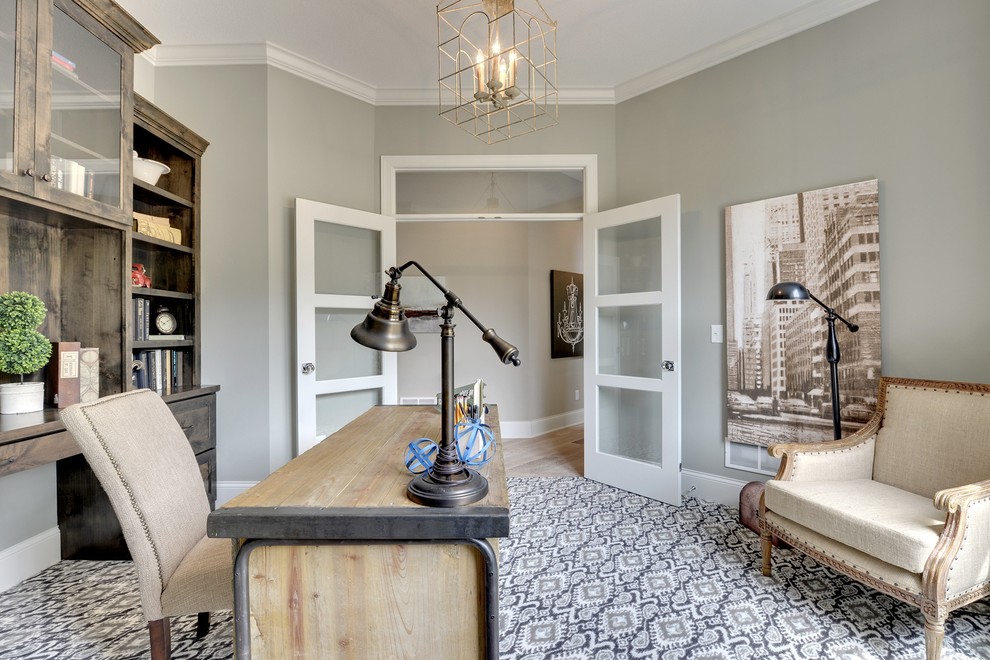 Study room - large transitional built-in desk carpeted study room idea in Minneapolis with gray walls and no fireplace