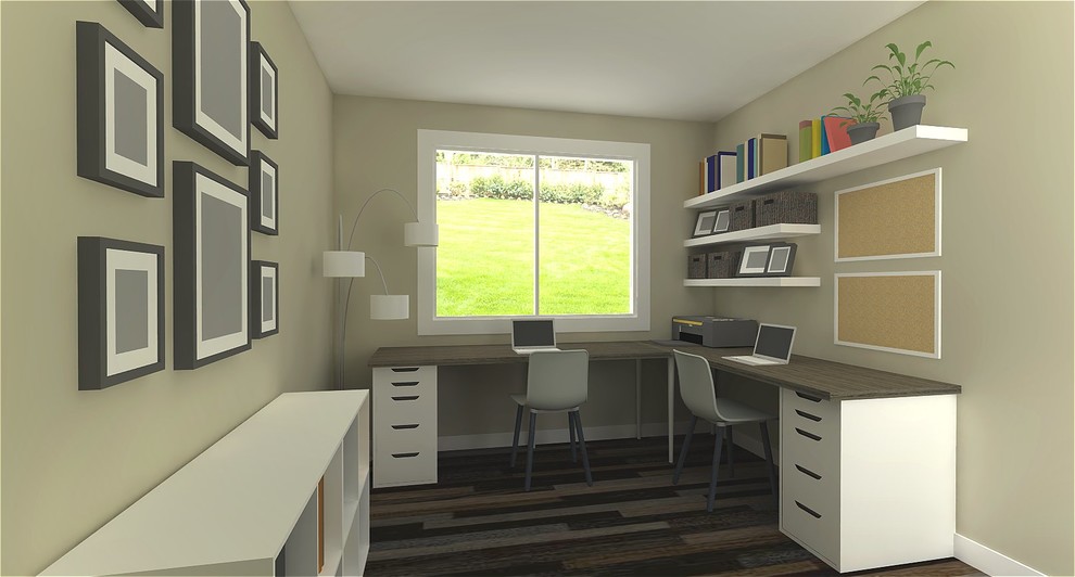 Exempel på ett litet modernt hemmabibliotek, med laminatgolv, ett fristående skrivbord och brunt golv