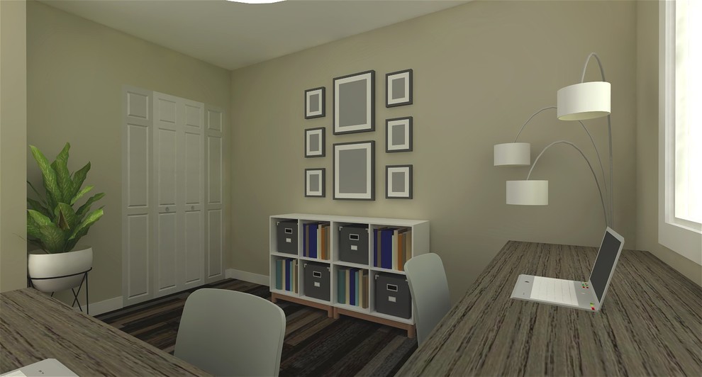 Imagen de despacho actual pequeño con suelo laminado, escritorio independiente y suelo marrón