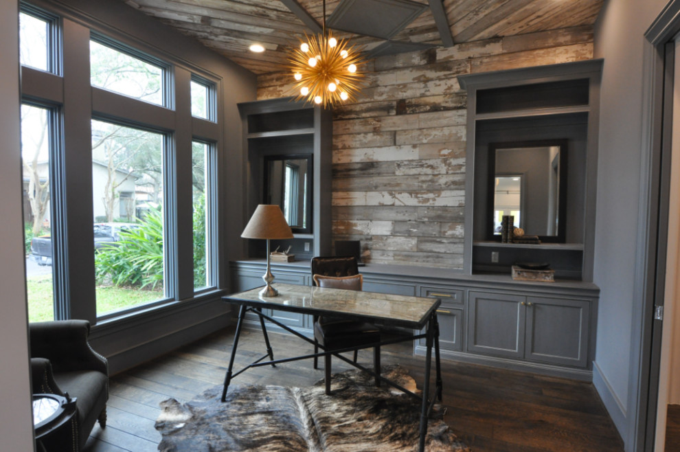 Photo of a medium sized rustic study in Houston with grey walls, dark hardwood flooring, no fireplace, a freestanding desk and brown floors.