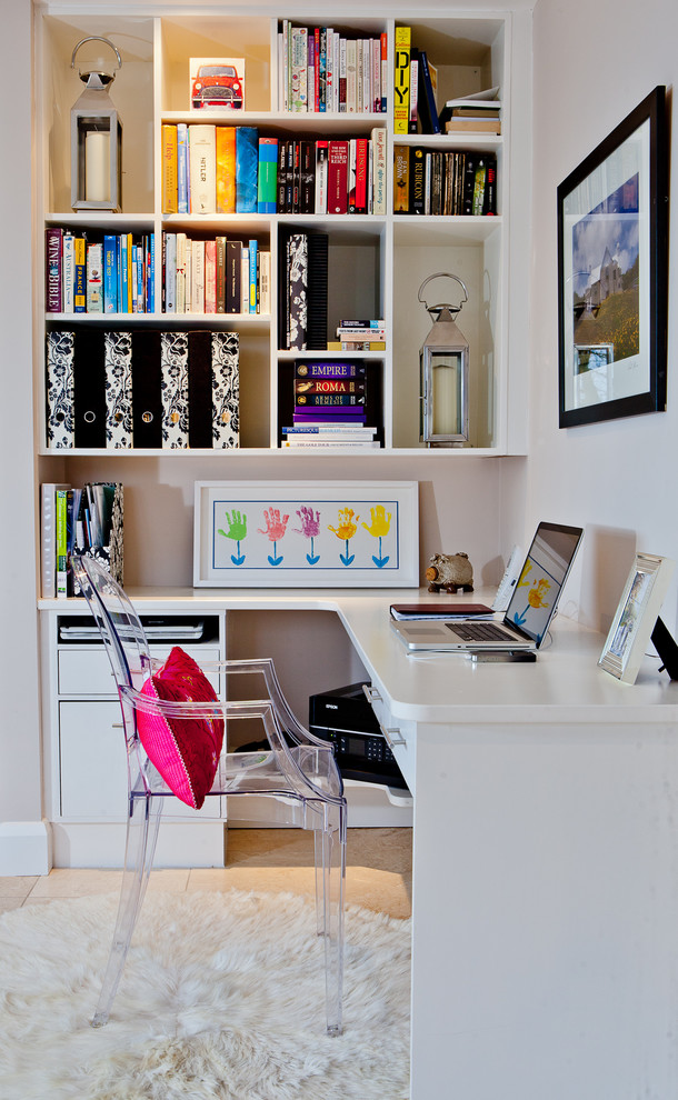 This is an example of a contemporary home office in Channel Islands.