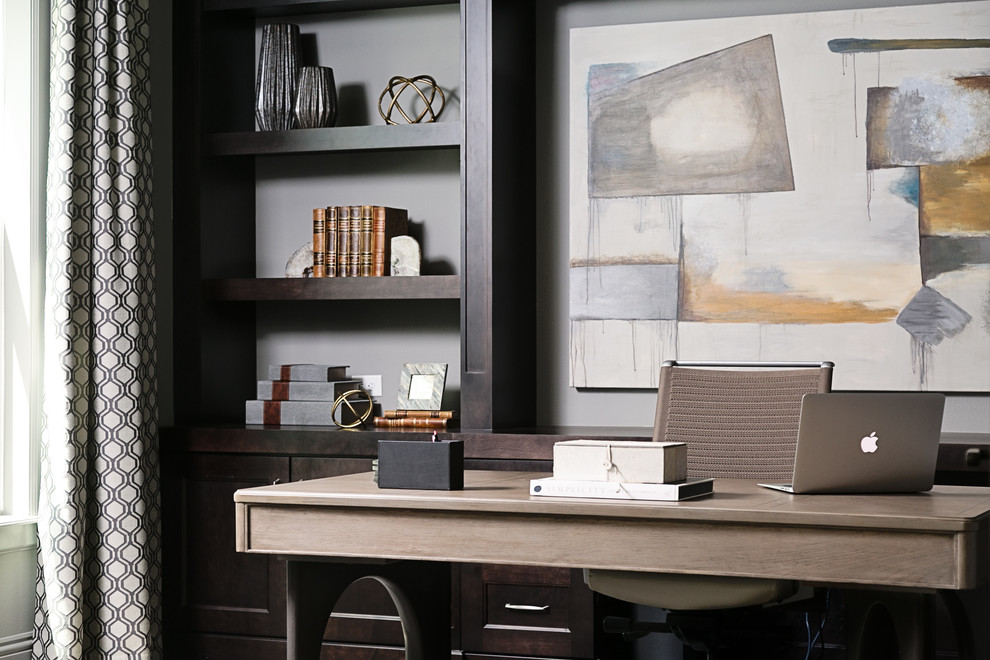 Inspiration for a classic study in Tampa with grey walls, dark hardwood flooring, no fireplace and a freestanding desk.