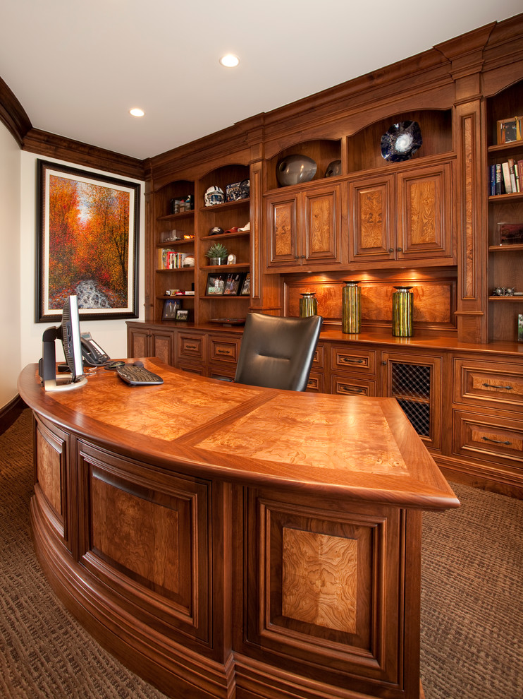 Elegant freestanding desk carpeted home office photo in Salt Lake City with white walls