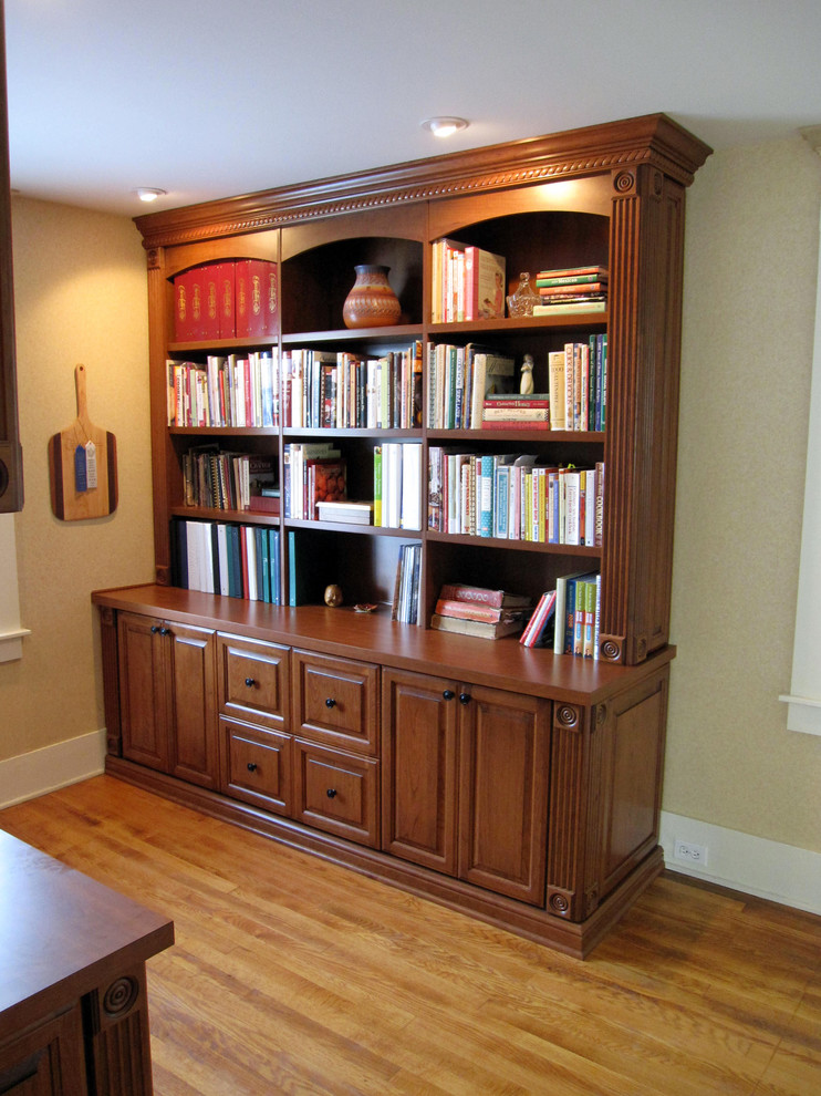 Traditional home office in Cleveland with a built-in desk.