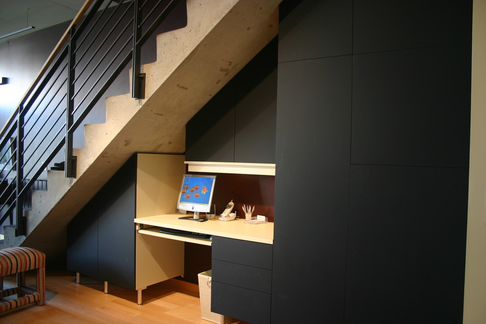 Example of a trendy home office design in Louisville