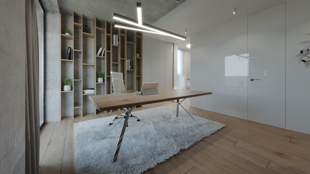 Esempio di un piccolo atelier minimalista con pareti bianche, pavimento in legno massello medio, nessun camino, scrivania autoportante e pavimento marrone