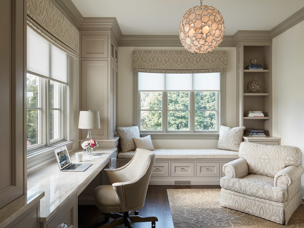 Study room - traditional built-in desk dark wood floor study room idea in Chicago with white walls and no fireplace
