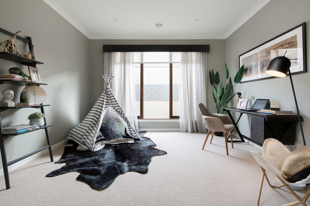 Study room - scandinavian freestanding desk carpeted and beige floor study room idea in Melbourne with gray walls