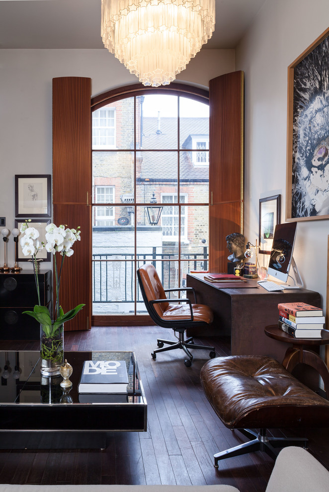 Photo of a contemporary study in London with white walls, dark hardwood flooring and a freestanding desk.