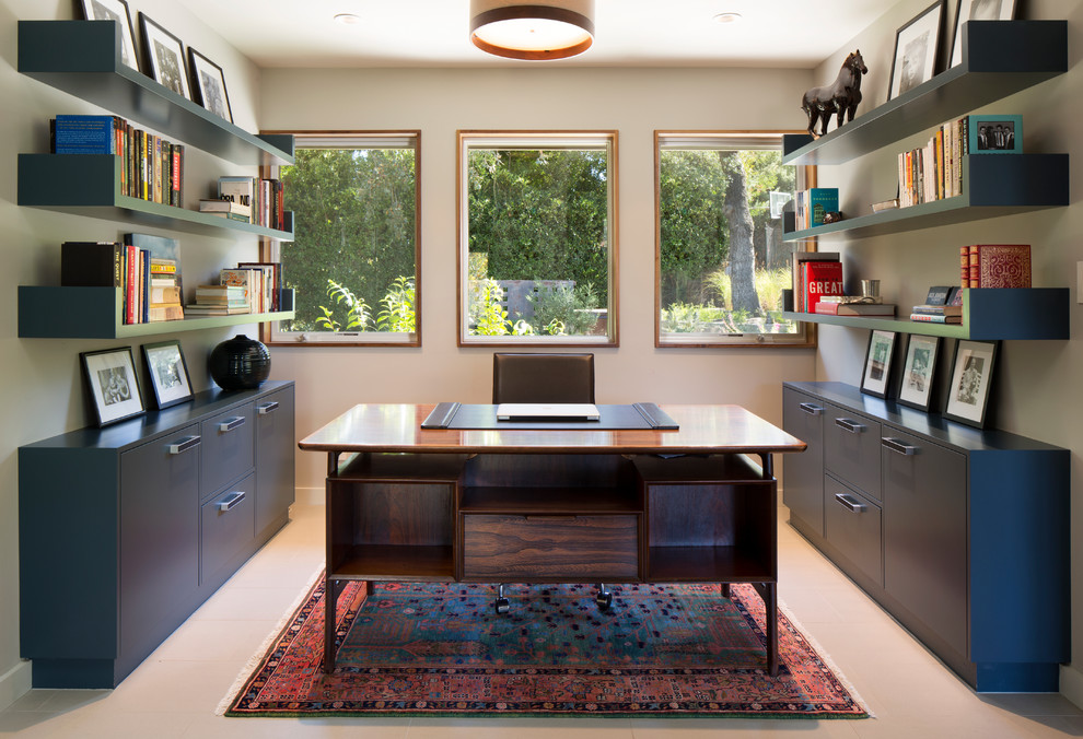 Inspiration for a contemporary home office in San Francisco with white walls, ceramic flooring and a freestanding desk.