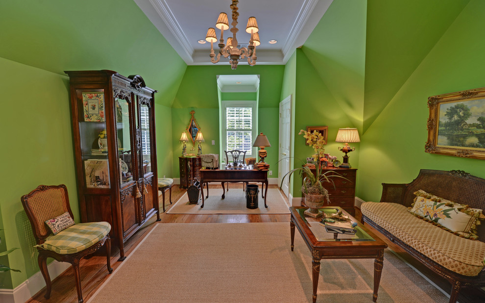 Example of a classic home office design in Atlanta with green walls