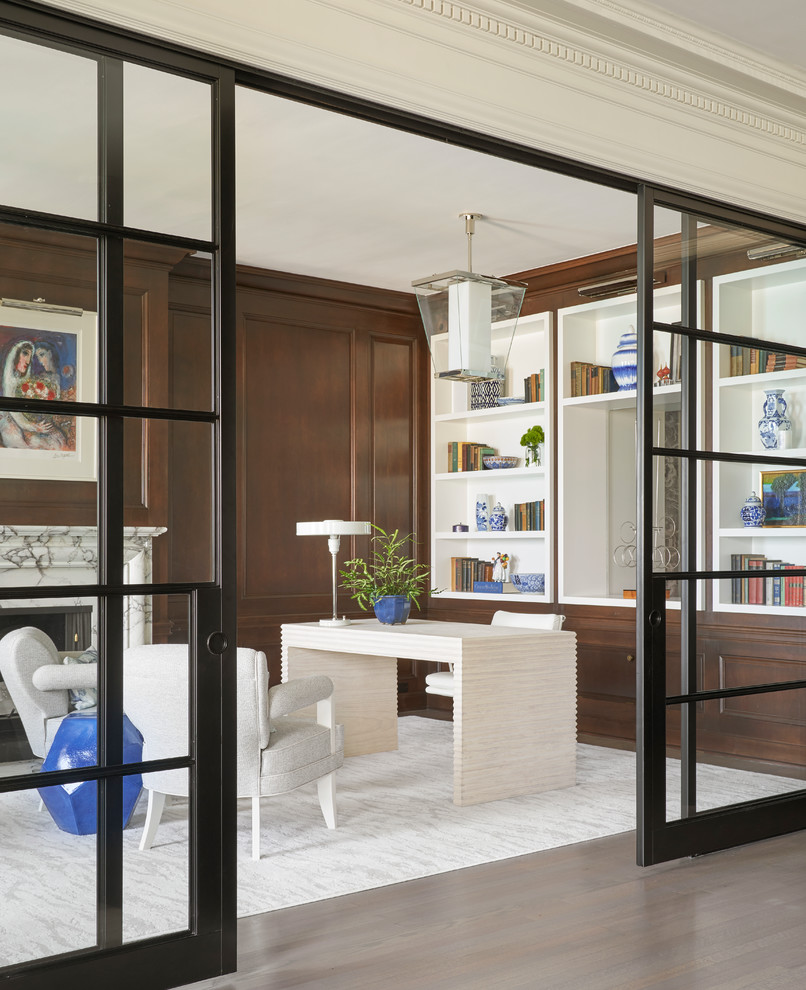 Example of a transitional home office design in Chicago