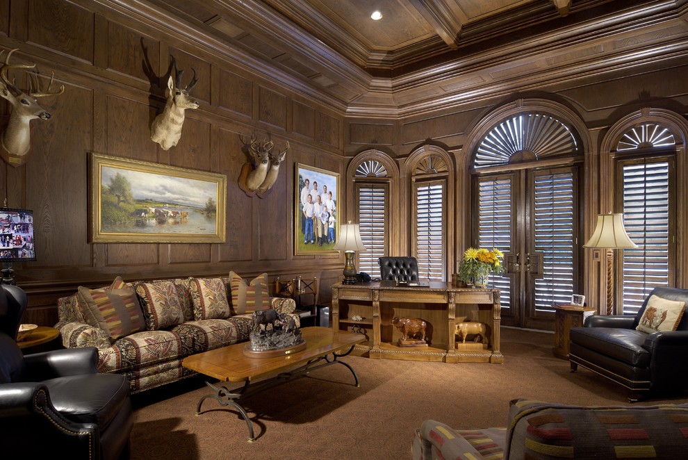 Example of a huge classic freestanding desk study room design in Tampa with a standard fireplace and a stone fireplace