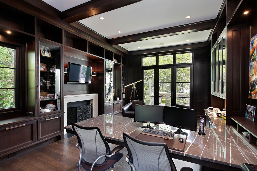 Example of a transitional built-in desk home office design in Chicago