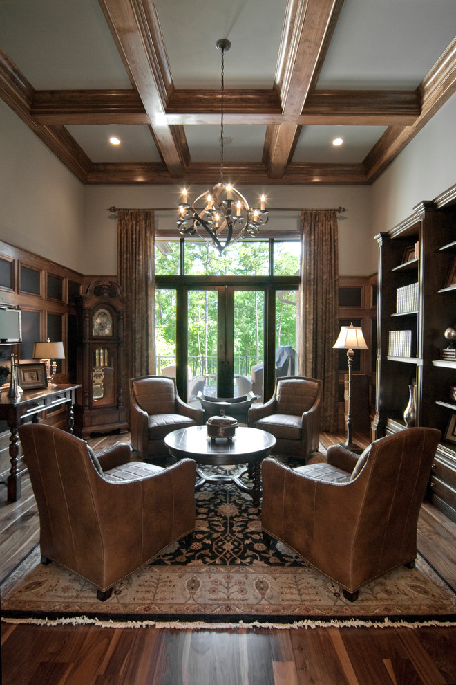 Study room - large traditional dark wood floor study room idea in Charlotte with white walls