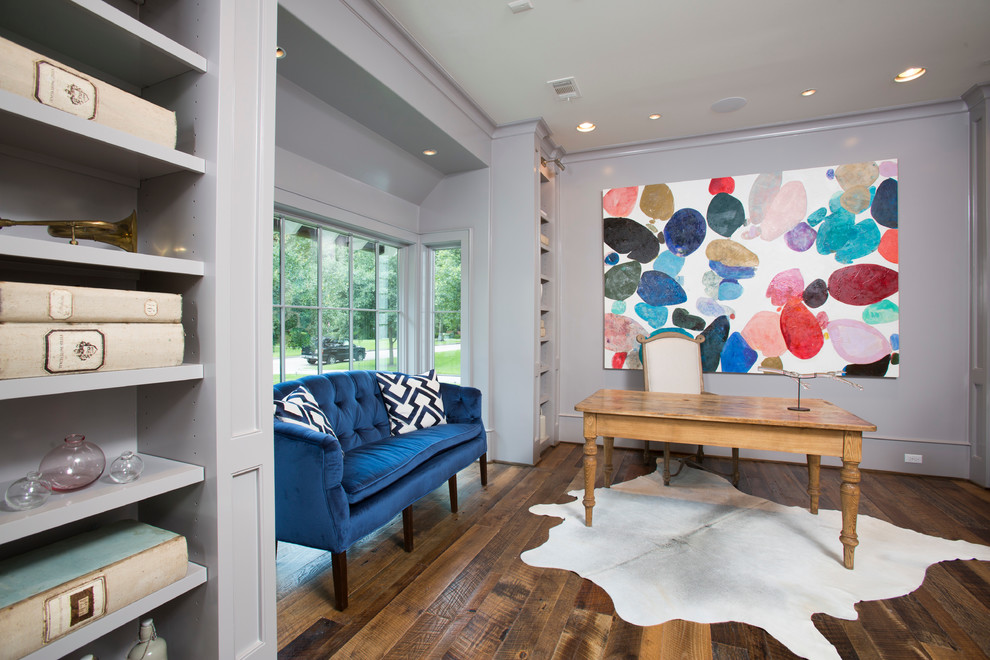 Photo of a large traditional study in Houston with dark hardwood flooring, a freestanding desk, no fireplace and grey walls.