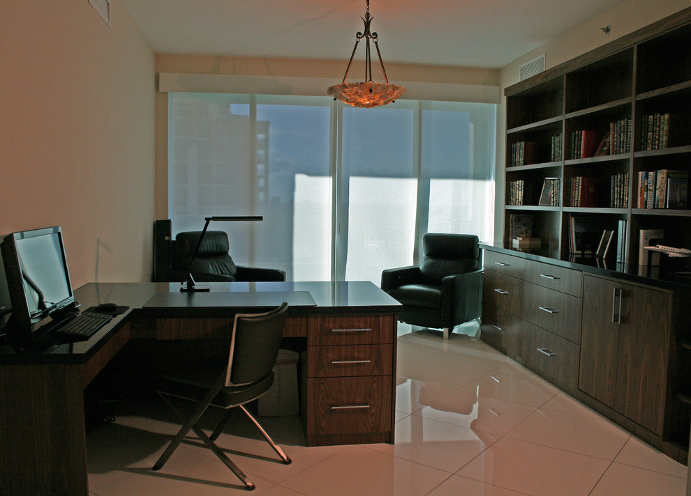 Medium sized contemporary home office in Miami with brown walls, porcelain flooring, a freestanding desk and white floors.