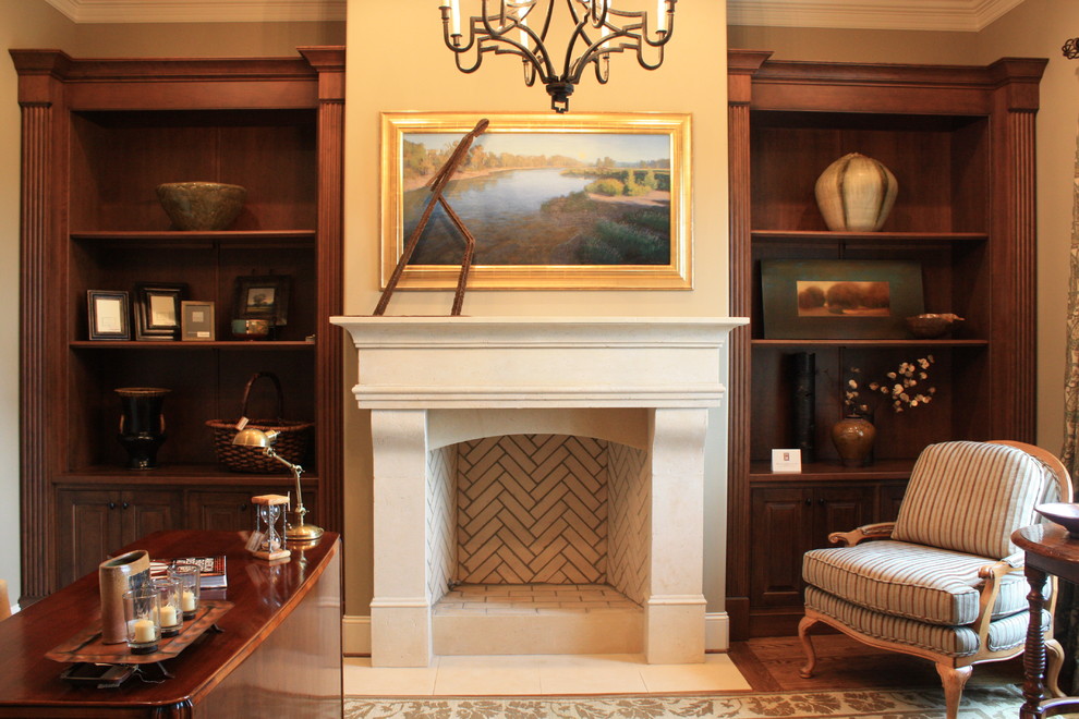 Inspiration for a timeless freestanding desk dark wood floor home office remodel in Nashville with beige walls and a standard fireplace
