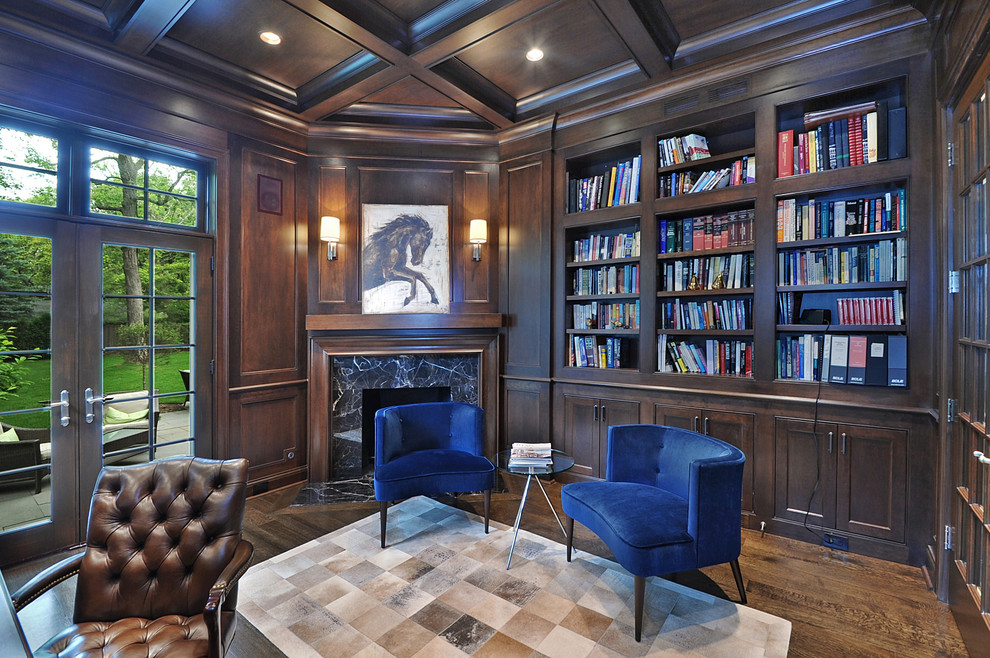 Photo of a traditional home office in Chicago with dark hardwood flooring.