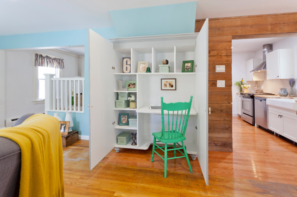 Inspiration for an eclectic built-in desk home office remodel in New York