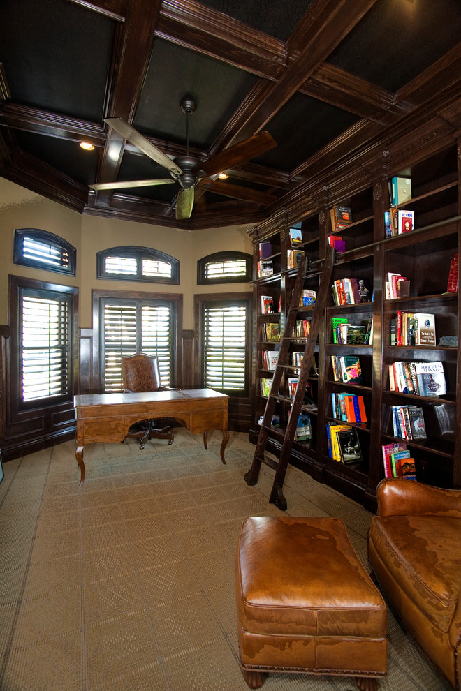 This is an example of a large classic home office in Tampa with a reading nook, beige walls, carpet, no fireplace and a freestanding desk.