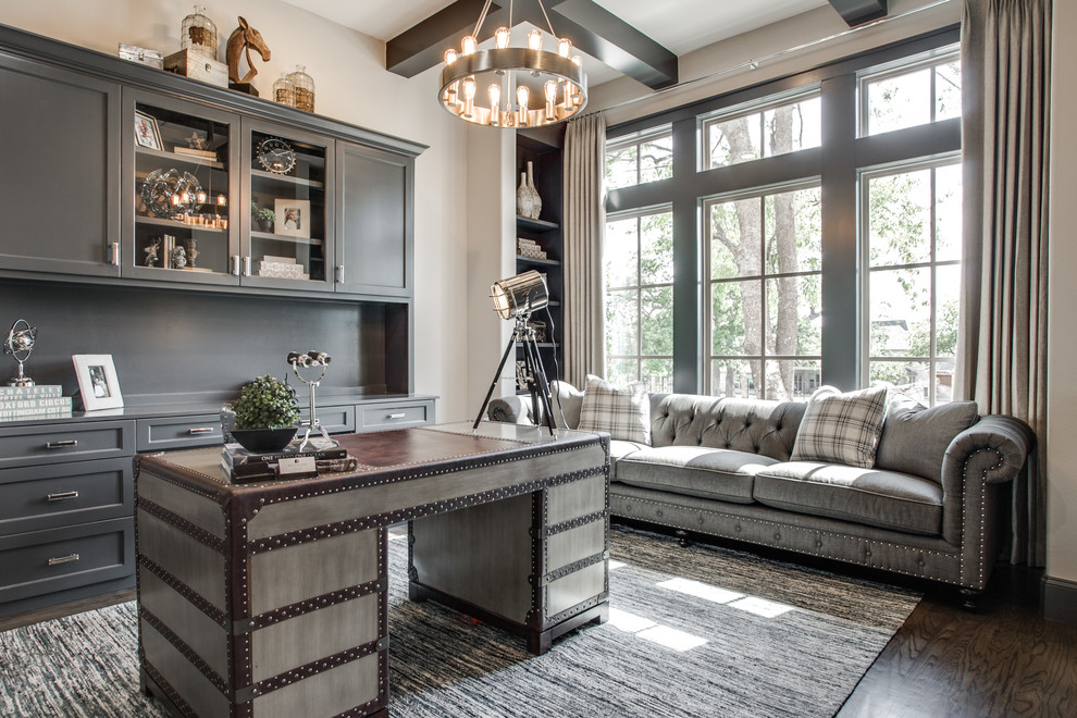 Study room - transitional freestanding desk dark wood floor study room idea in Dallas with gray walls and no fireplace