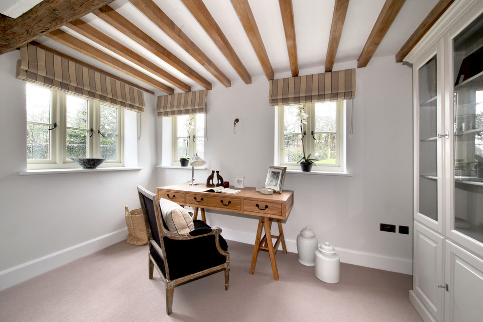 Photo of a medium sized country study in Berkshire with grey walls, carpet, no fireplace and a freestanding desk.