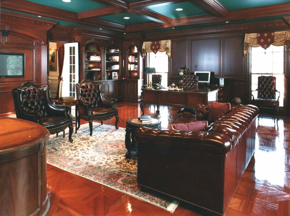 Design ideas for a large victorian study in Chicago with brown walls and a freestanding desk.