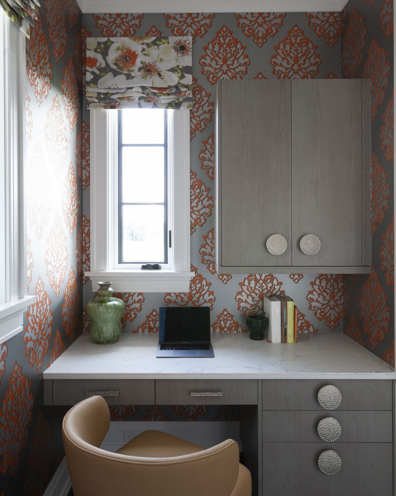 Foto de despacho contemporáneo con paredes multicolor, escritorio empotrado y papel pintado