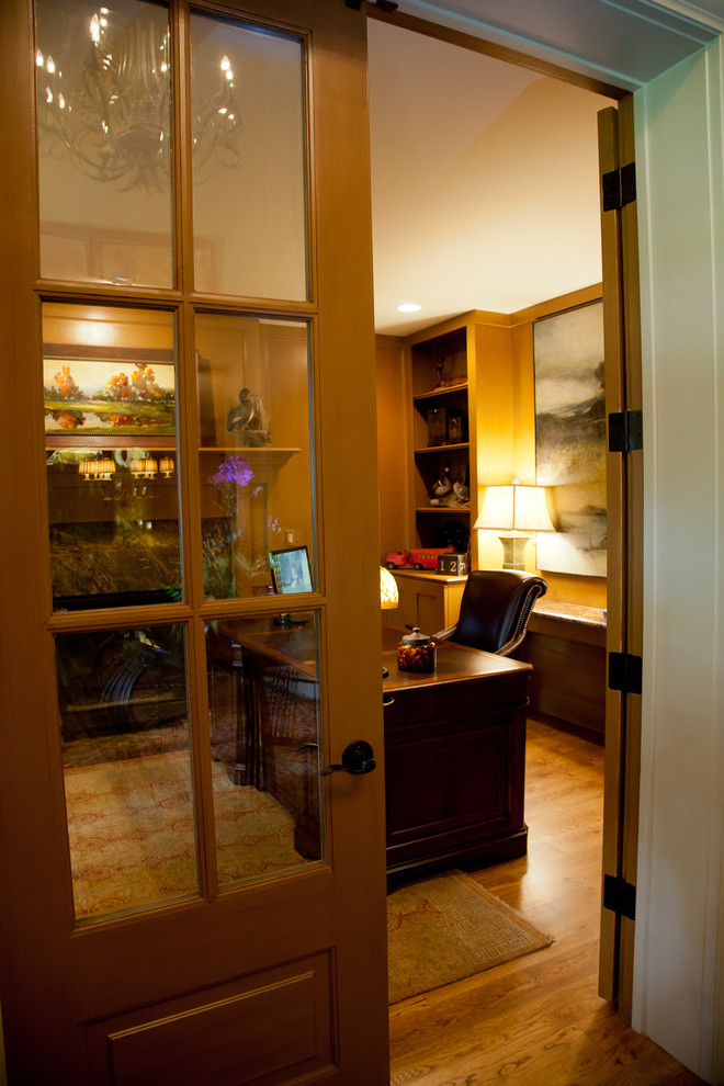 Example of a mid-sized eclectic home office design in Other