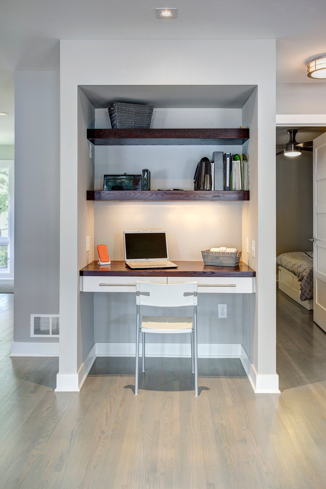 Example of a trendy home office design in Minneapolis
