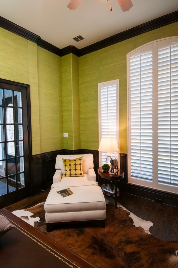 Example of a large transitional dark wood floor home office design in Dallas with green walls