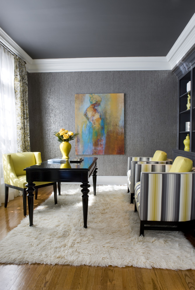 Home office - mid-sized contemporary freestanding desk medium tone wood floor home office idea in DC Metro with gray walls