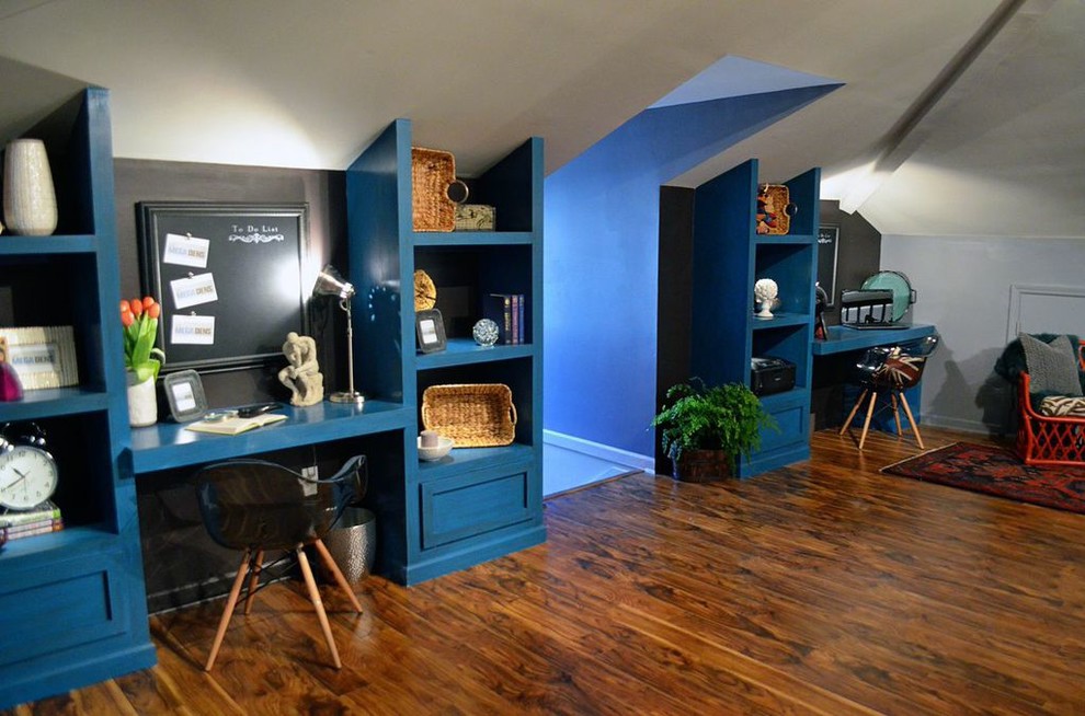 Inspiration for a large eclectic built-in desk study room remodel in Atlanta with blue walls