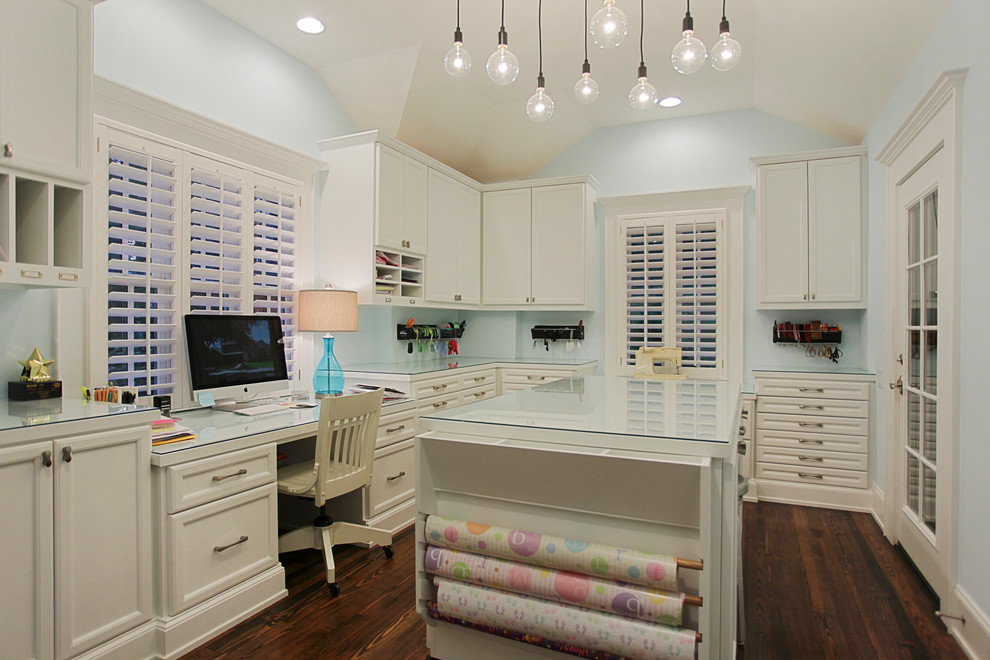 Craft room - traditional craft room idea in Houston with blue walls