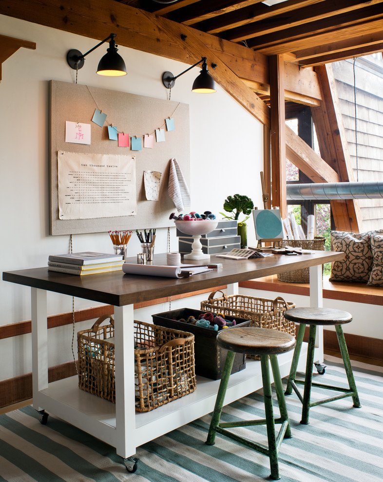 Home studio - contemporary freestanding desk home studio idea in San Francisco with white walls