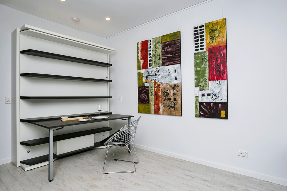 Example of a trendy home office design in Sydney