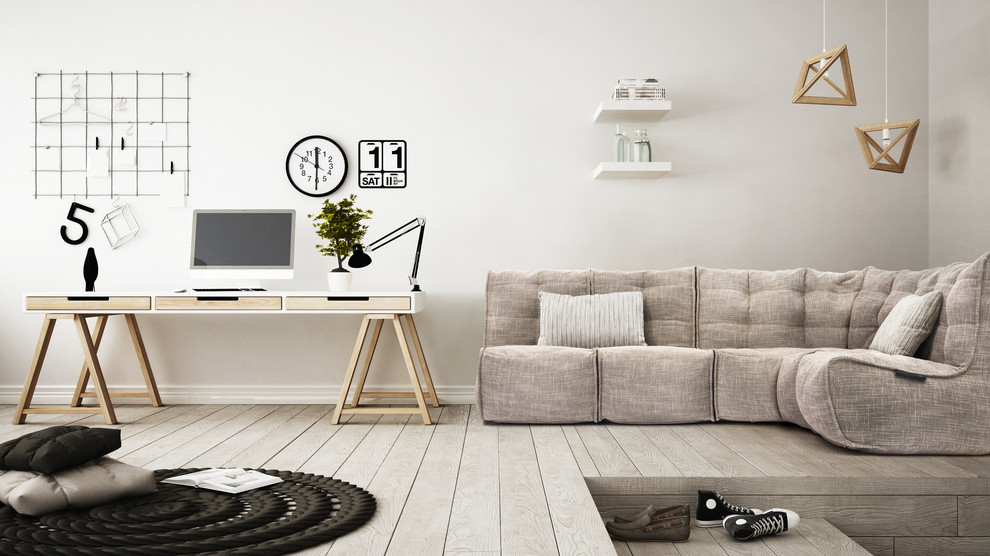 Aménagement d'un bureau contemporain de taille moyenne avec un mur beige, parquet clair, aucune cheminée, un manteau de cheminée en plâtre, un bureau indépendant et un sol gris.